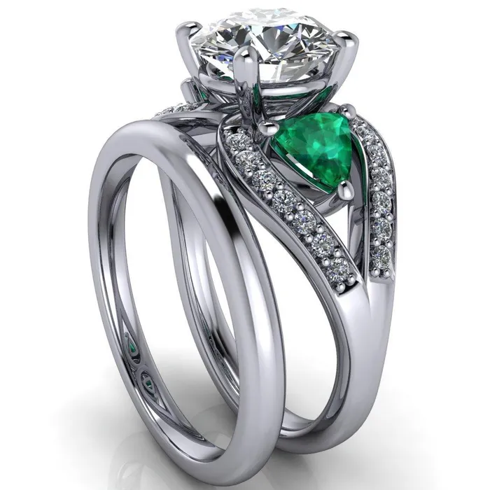 Fire Brilliance Rings Kassandra Round Center Stone 4 Prong Trillion Emerald Side Split Shank Accent Engagement Ring