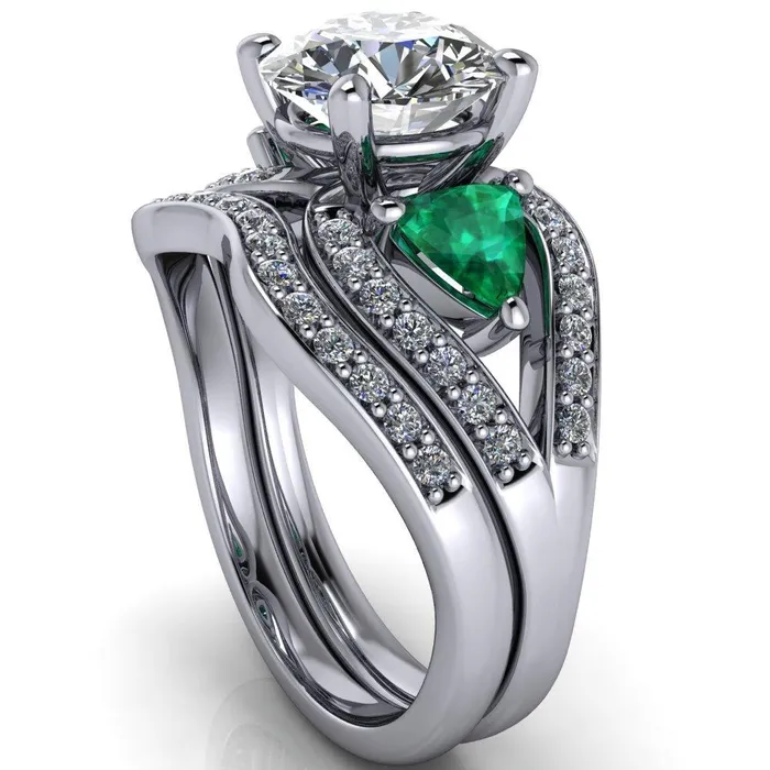Fire Brilliance Rings Kassandra Round Center Stone 4 Prong Trillion Emerald Side Split Shank Accent Engagement Ring
