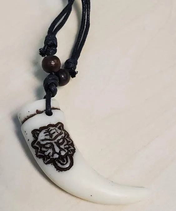 Necklaces POLLY N1682 White Lion on Tooth on Leather Cord Necklace