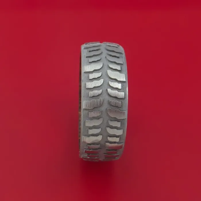 Rings Lashbrook Titanium Ring with Mud Tire Tread Pattern Inlay and Interior Hardwood Sleeve Custom Made Band Rings Lashbrook Titanium Ring with Mud Tire Tread Pattern Inlay and Interior Hardwood Sleeve Custom Made Band