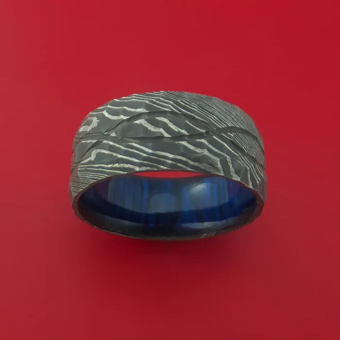 Rings Wide Hammered Damascus Steel Ring with Infinity Milled Celtic Design Inlay and Interior Hardwood Sleeve Custom Made Band Lashbrook Rings Wide Hammered Damascus Steel Ring with Infinity Milled Celtic Design Inlay and Interior Hardwood Sleeve Custom Made Band Lashbrook